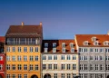 beautiful historical houses against blue sky at sunny day, copenhagen, denmark