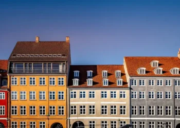 beautiful historical houses against blue sky at sunny day, copenhagen, denmark