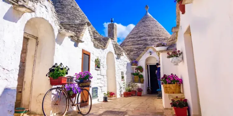 Alberobello, Puglia, Italy: Typical houses built with dry stone walls and conical roofs