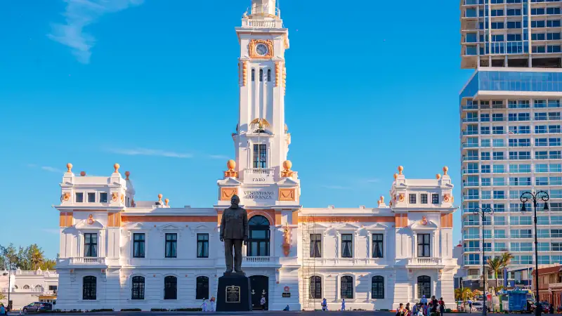 View of Faro Venustiano Carranza, historic 1902 neoclassical building on the Gran Plaza del Malecon at Veracruz, Mexico.