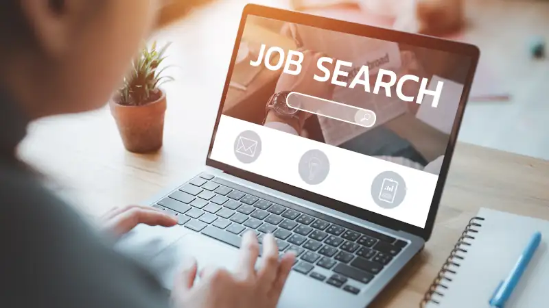 woman using laptop for job search