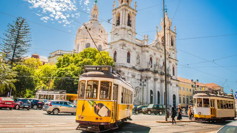 Yellow tram 28 on streets of Lisbon, Portugal