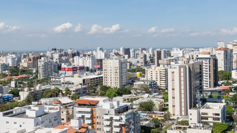 View from a drone flying over the city of Santo Domingo on a beautiful sunny day.