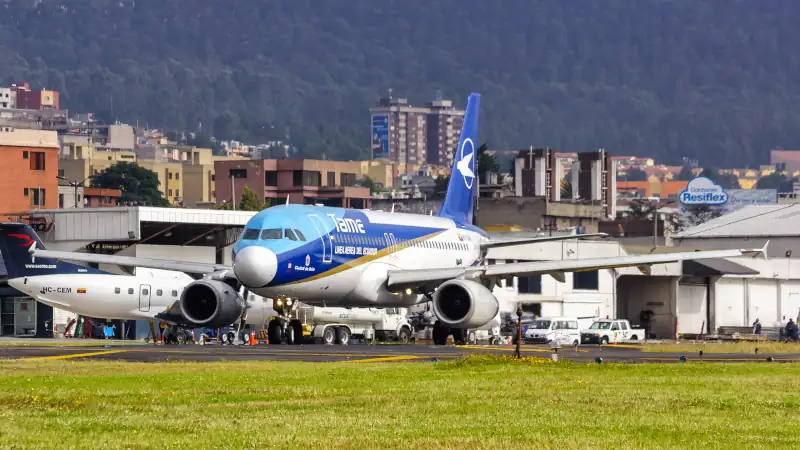 Airbus A320 airplane at Quito airport, Ecuador, showing international travel.