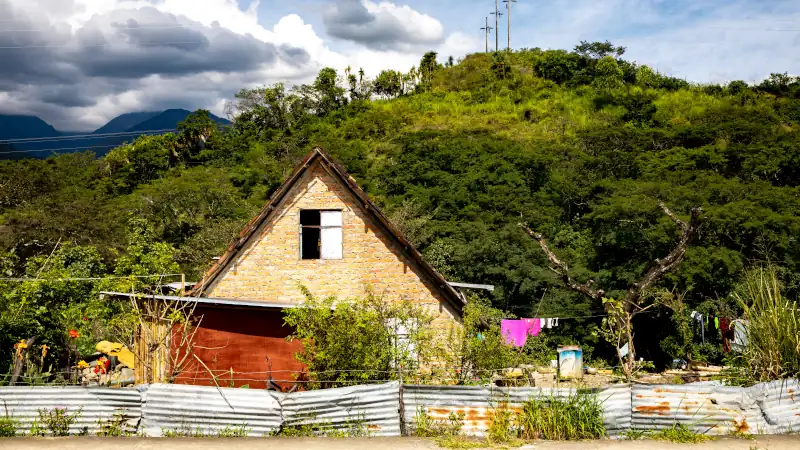Modern house near Vilcabamba, Ecuador, showcasing local architecture and natural setting.
