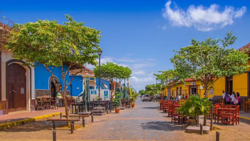 Colorful market stalls and street scene in Granada, Nicaragua.