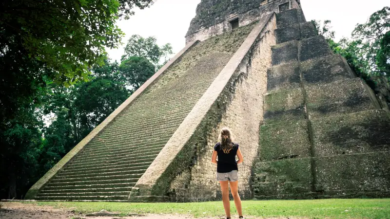 Maya temple ruins at Tikal in Guatemala jungle setting
