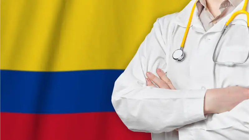 Republic of Colombia healthcare concept with doctor on flag background. Medical insurance, work or study in the country.