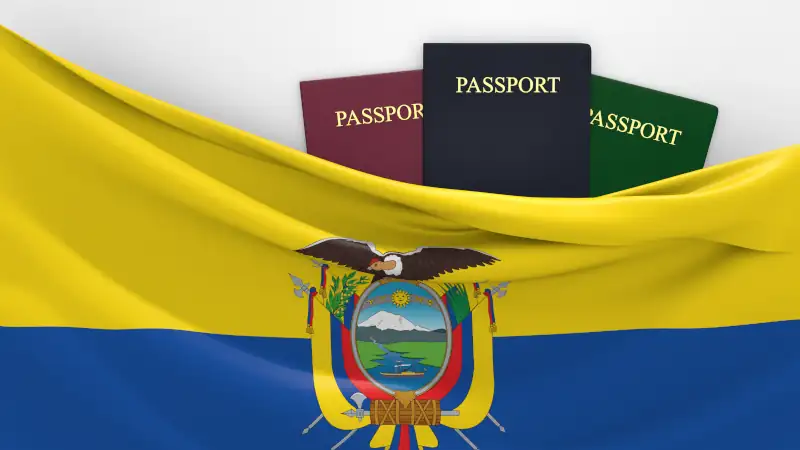 Assorted passports and travel documents, symbolizing international movement to Ecuador.