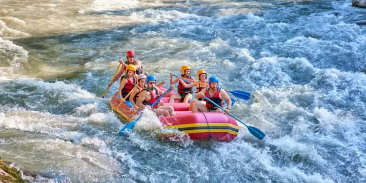 rafting on a stormy mountain river in summer