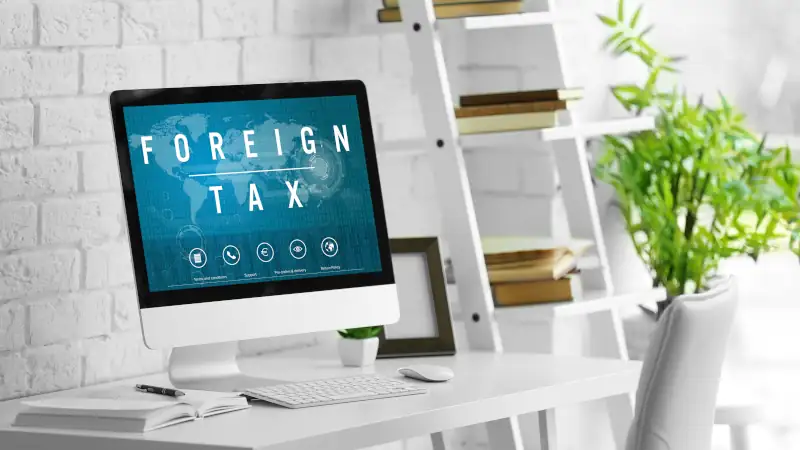 Digital screen showing foreign tax rates and corporate tax structures