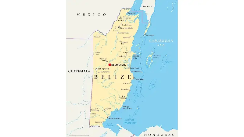 A political map of Belize showing major cities, towns, neighboring countries (Mexico and Guatemala), the Caribbean Sea, and the location of the capital, Belmopan.