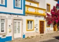bougainvillea in front of a traditional Algarve house, in Tavira, Portugal