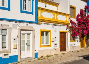 bougainvillea in front of a traditional Algarve house, in Tavira, Portugal