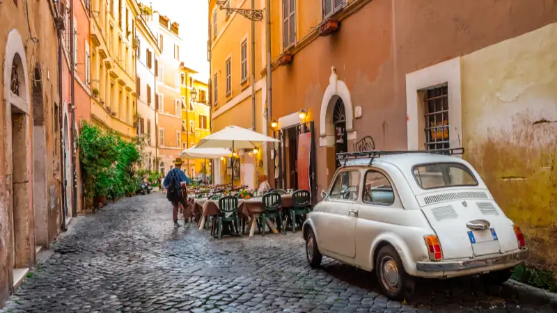 Cozy street in Trastevere, Rome, Italy showing historical architecture