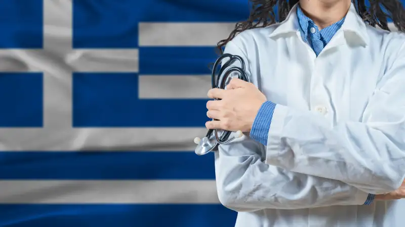Healthcare professional with Greece flag background