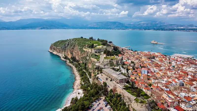 View from Palamidi on Nafplio city in Greece with port, Bourtzi fortress, and blue Mediterranean sea