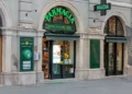 Local pharmacy store on empty street in Venice during day hours