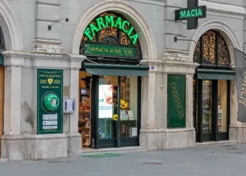 Local pharmacy store on empty street in Venice during day hours