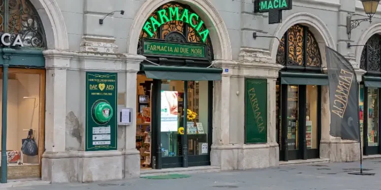 Local pharmacy store on empty street in Venice during day hours
