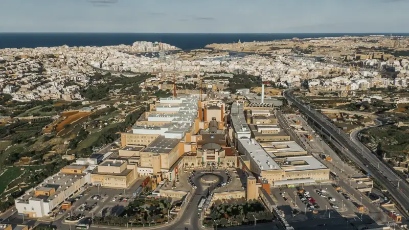 Mater Dei Hospital building in Malta, representing healthcare facilities.