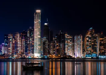Panama City Skyline at Night with water reflecting the light