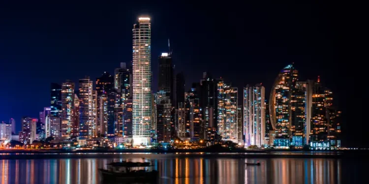 Panama City Skyline at Night with water reflecting the light