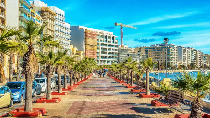 Promenade and creek view in Sliema, Malta, during the morning.