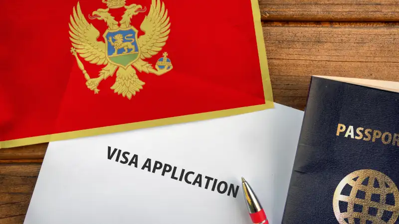 Visa application form, passport and flag of Montenegro