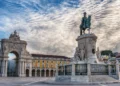 Lisbon, Portugal: the Triumphal Rua Augusta Arch, Arco Triunfal da Rua Augusta, Praca do Comercio and Statue of King Jose I at sunrise