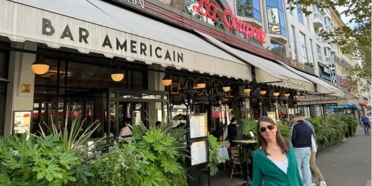 Kathleen Peddicord outside Bar Américain in Paris.