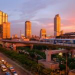 Sunsets over the Skytrain tracks in Bangkok, Thailand.