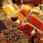 Brightly colored spices for sale at a Turkish market.