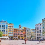 Panorama of Constitution Square with a fountain, Malaga, Spain