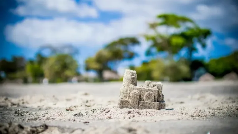 Palm trees, sand castle o a tropical beach. panama city beaches