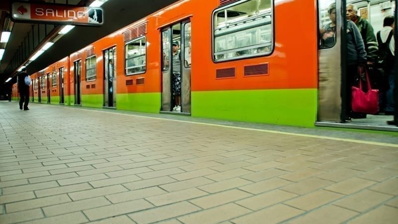 Subway train and walk at station on a common day on Mexico City, Mexico.