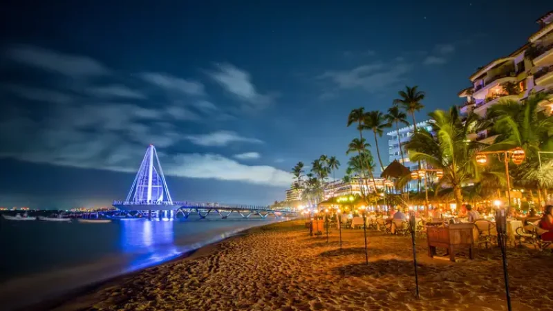 Puerto Vallarta Pier at Night. taxes in mexico