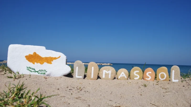 Limassol, Cyprus on stones with sand background. limassol